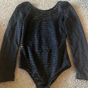 See through black body suit